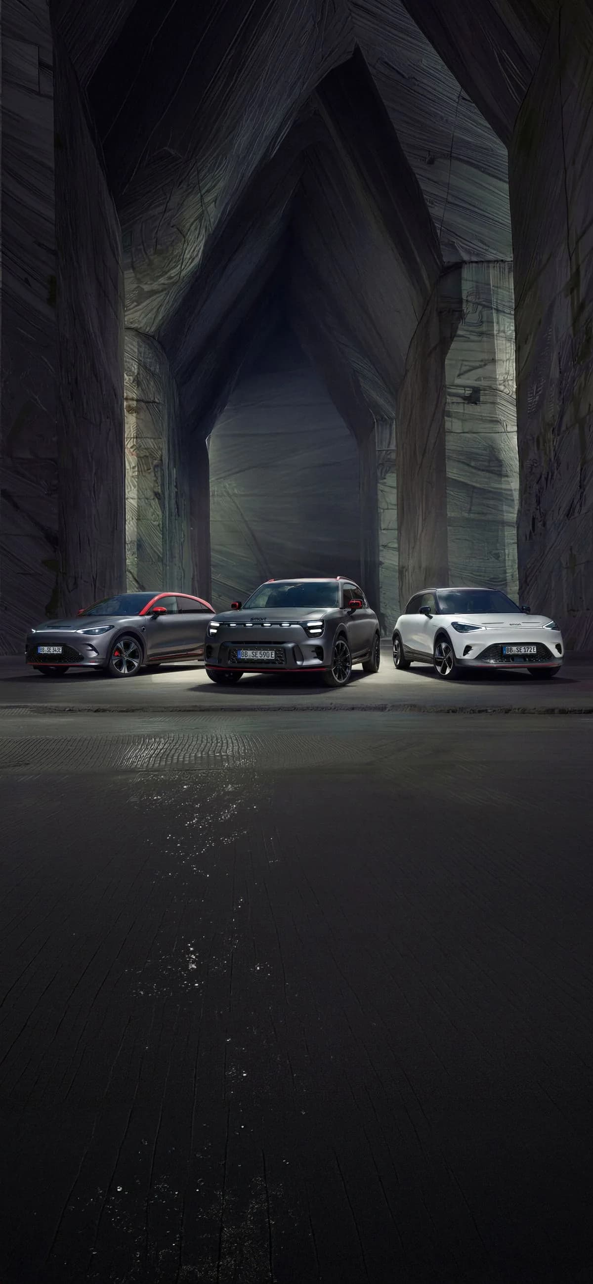 smart #3, #5 y #1 BRABUS aparcados en una nave de piedra oscura