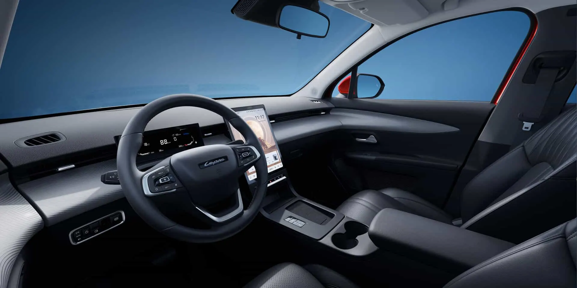Interior del LEPAS L4 con volante y pantalla central